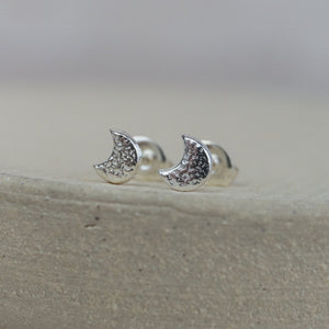 
                  
                    Sterling silver textured mini moon studs
                  
                