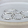 sterling silver textured thin stacking ring handmade by Lucy Kemp Jewellery -group shot