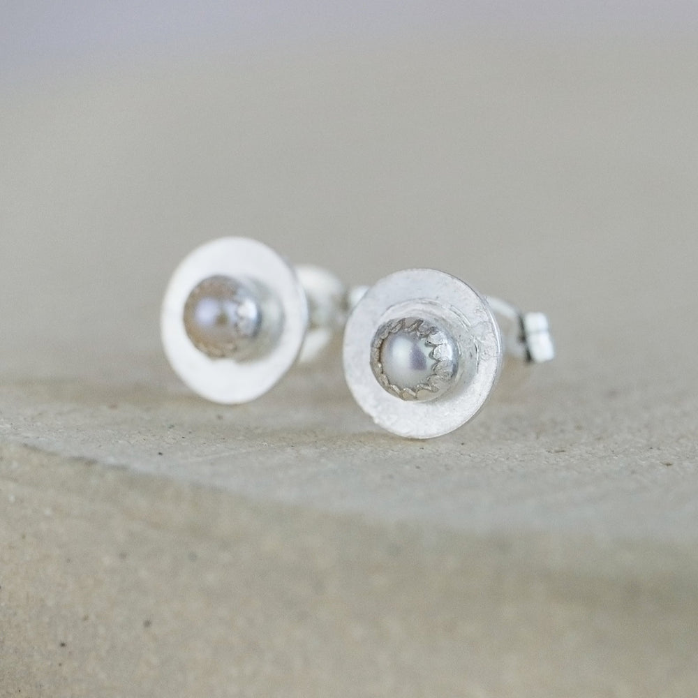 
                  
                    Pearl and sterling silver birthstone small disc studs by Lucy Kemp Jewellery
                  
                