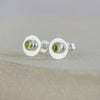 Peridot and sterling silver birthstone small disc studs by Lucy Kemp Jewellery