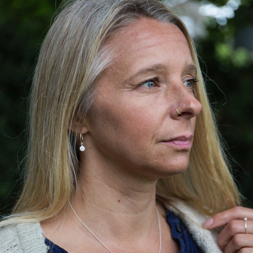 sterling silver opal sleeper hoops handmade by Lucy Kemp Jewellery - worn image