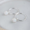 sterling silver opal sleeper hoops handmade by Lucy Kemp Jewellery 