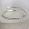 recycled sterling silver lace textured christening bangle handmade by Lucy Kemp Jewellery