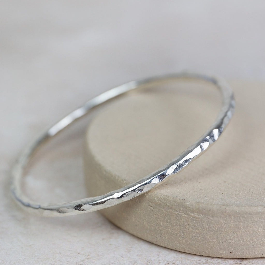sterling silver thick hammered statement bangle handmade by Lucy Kemp Jewellery