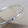 sterling silver thick hammered statement bangle handmade by Lucy Kemp Jewellery