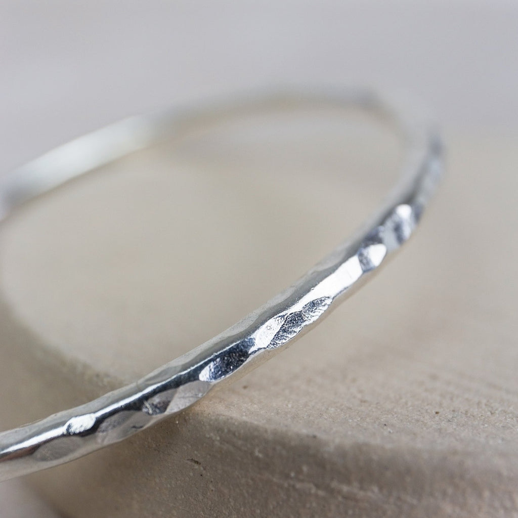 sterling silver thick hammered statement bangle handmade by Lucy Kemp Jewellery