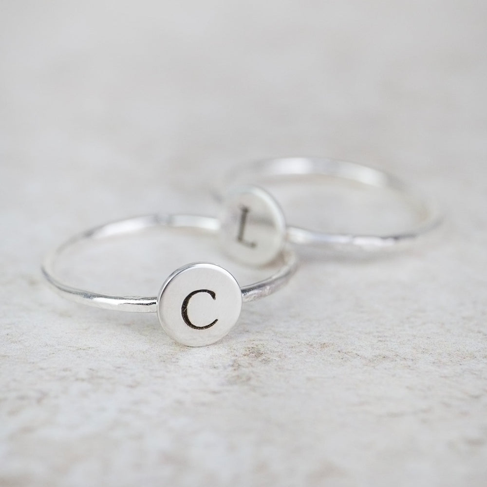 
                  
                    sterling silver personalised initial charm ring handmade and engraved by Lucy Kemp Jewellery  - 2 ring shot
                  
                