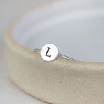 sterling silver personalised initial charm ring handmade and engraved by Lucy Kemp Jewellery 