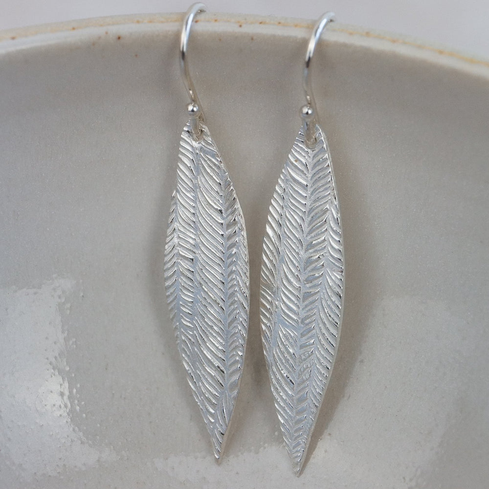 Sterling silver palm leaf textured earrings by Lucy Kemp jewellery