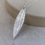 sterling silver textured palm leaf pendant by Lucy Kemp Jewellery