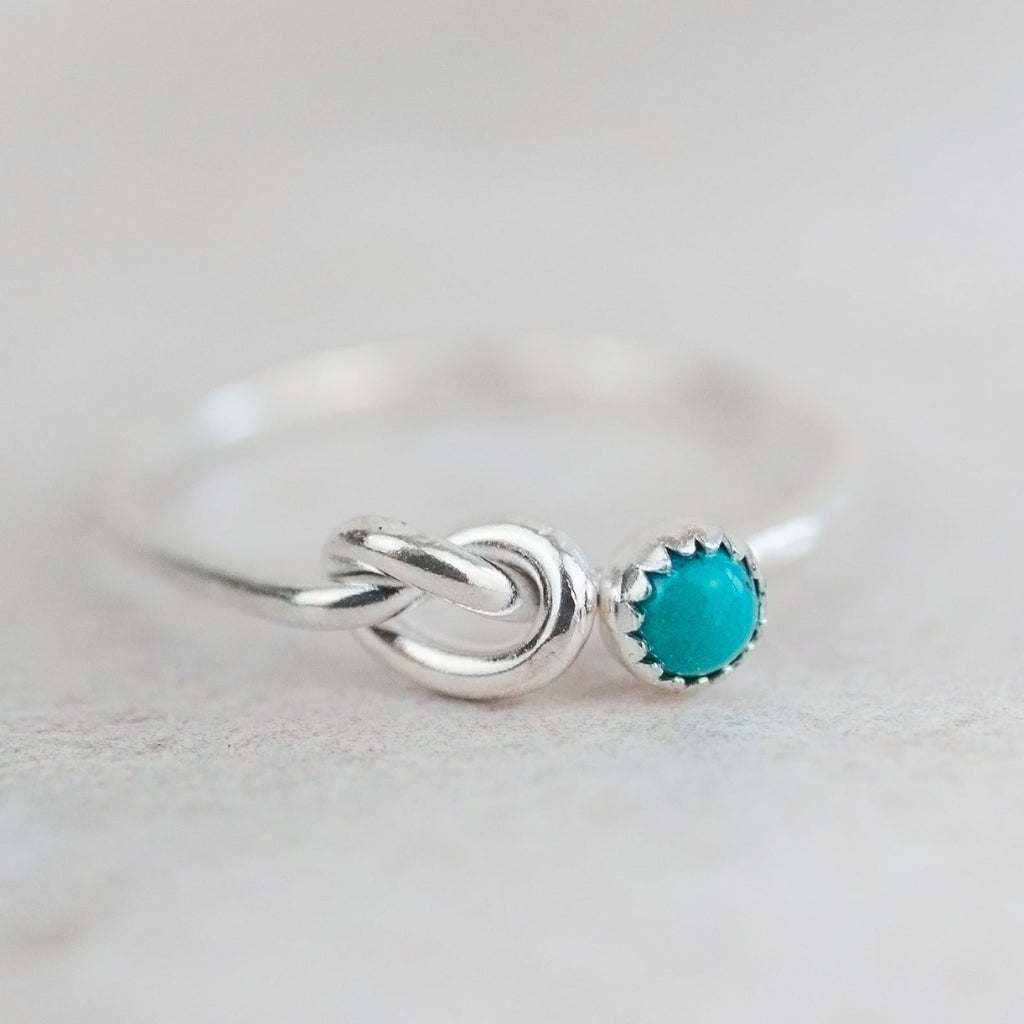 sterling silver birthstone love knot ring by Lucy Kemp Jewellery with Turquoise