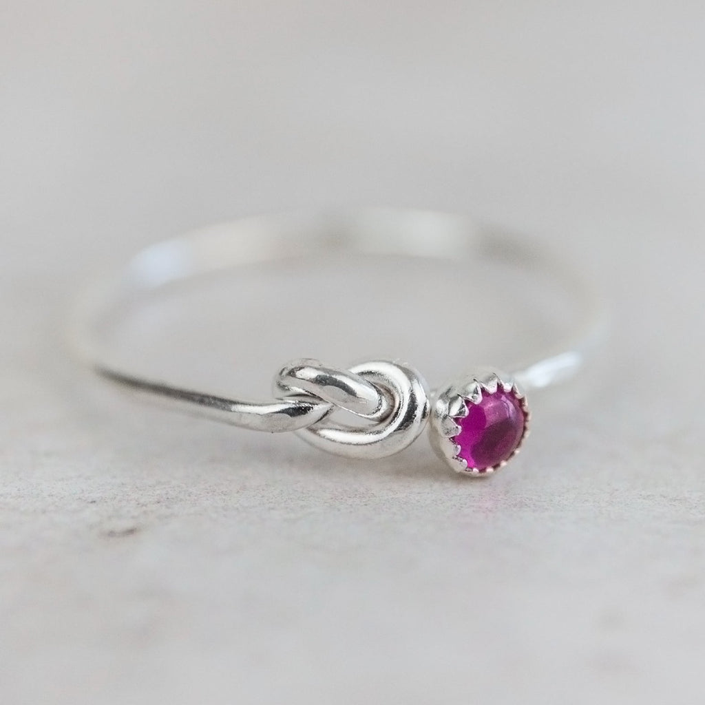 sterling silver birthstone love knot ring by Lucy Kemp Jewellery with Ruby