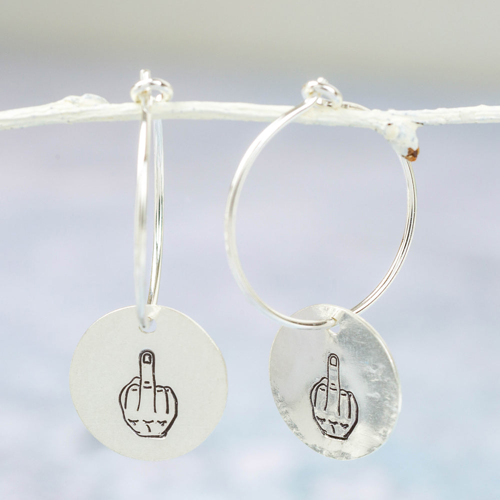 handmade sterling silver middle finger fun charm hoops by Lucy Kemp Jewellery in Cornwall
