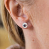 worn Sapphire (SYN) and sterling silver birthstone small disc studs by Lucy Kemp Jewellery