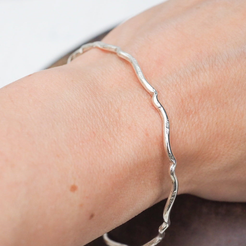 sterling silver scroll bangle handmade by Lucy Kemp Jewellery