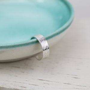 
                  
                    Sterling Silver toe ring with hammered texture, handmade by Lucy Kemp Jewellery
                  
                