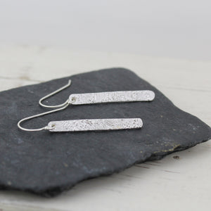 
                  
                    Sterling silver long rectangle textured drop earrings handmade by Lucy Kemp Jewellery
                  
                
