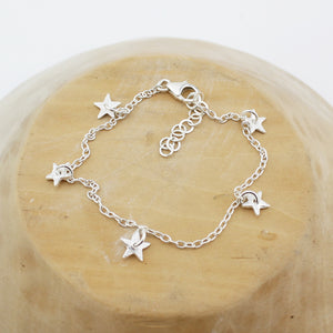 
                  
                    sterling silver star charm bracelet handmade by Lucy Kemp Jewellery
                  
                