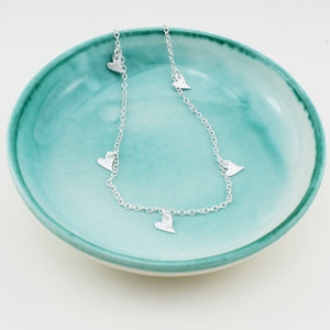 
                  
                    sterling silver short textured tilted heart charm necklace by Lucy Kemp Jewellery
                  
                