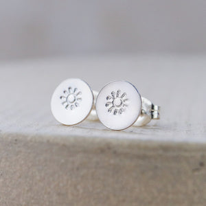 
                  
                    sterling silver sun stamped studs
                  
                