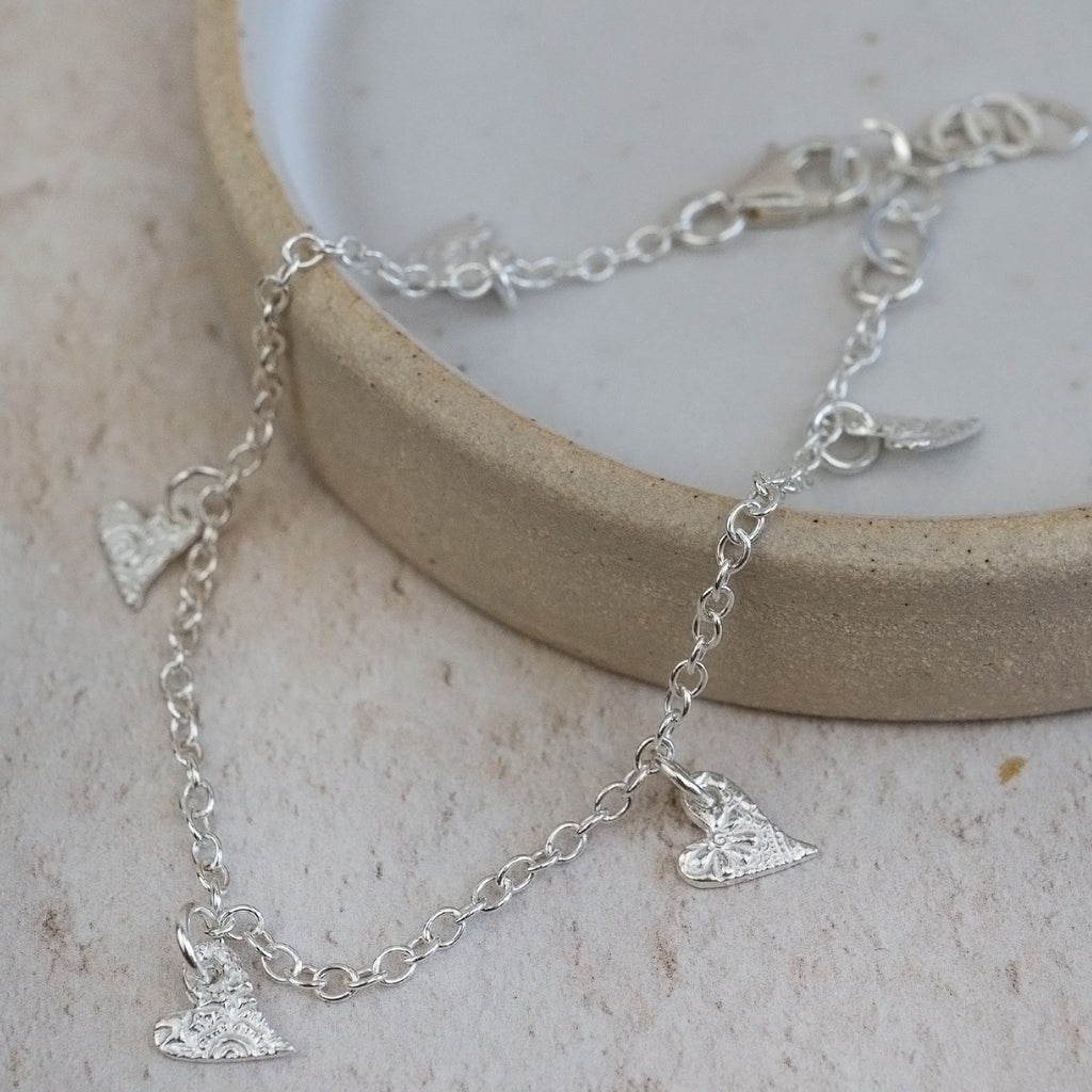 sterling silver textured tilted heart charm bracelet