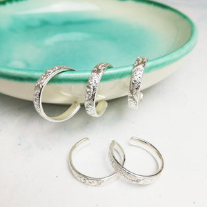 
                  
                    Sterling silver, recycled sterling silver lace textured toe rings, handmade by Lucy Kemp Jewellery
                  
                