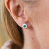 worn Turquoise and sterling silver birthstone small disc studs by Lucy Kemp Jewellery