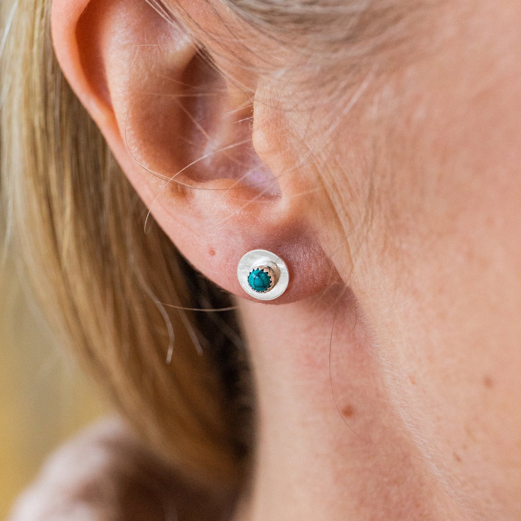 worn Turquoise and sterling silver birthstone small disc studs by Lucy Kemp Jewellery