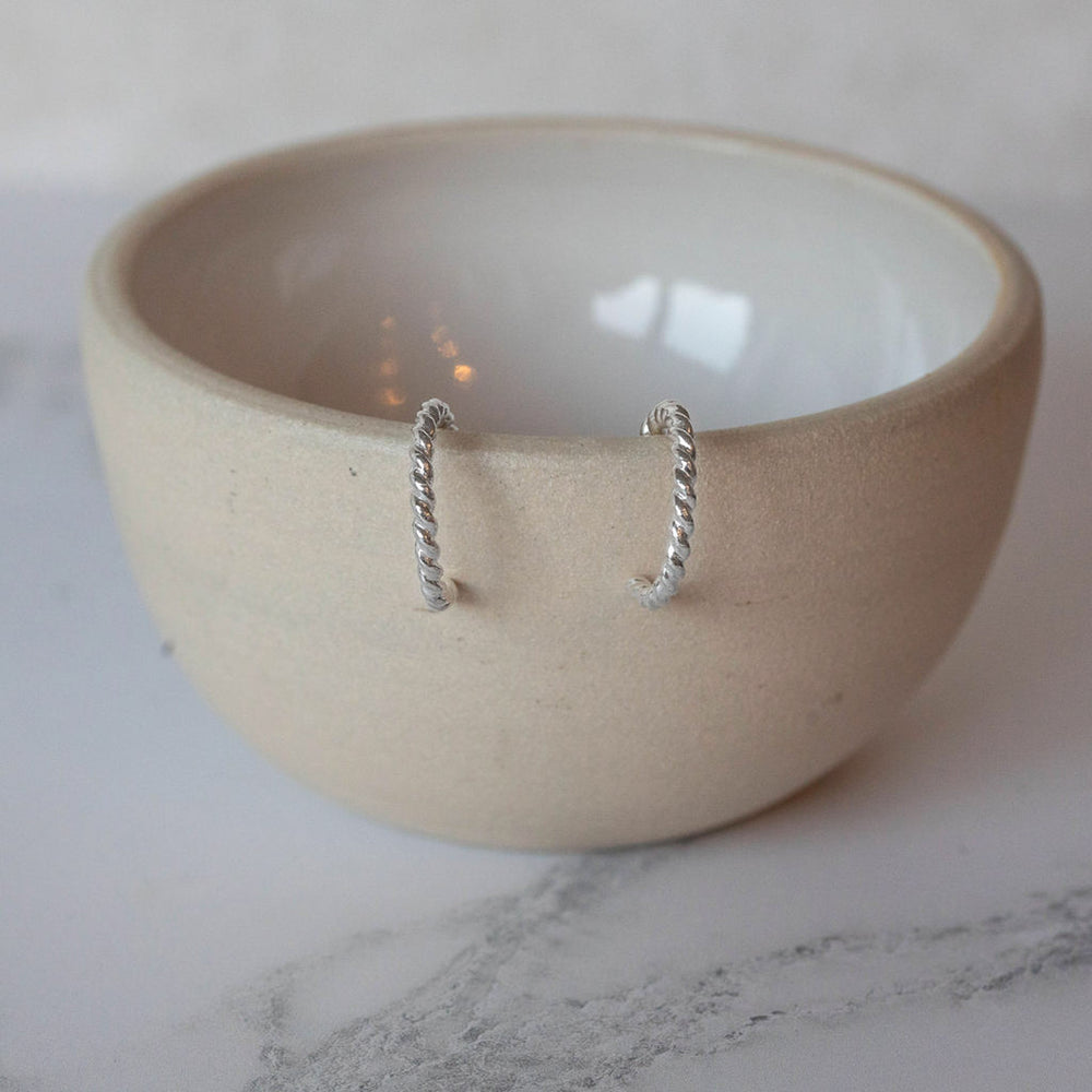 
                  
                    sterling silver twisty everyday hoops handmade by Lucy Kemp Jewellery
                  
                