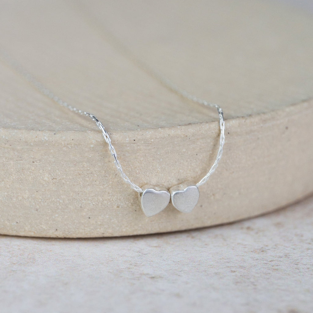 sterling silver heart bead charm necklace handmade by Lucy Kemp Jewellery - 2 charms