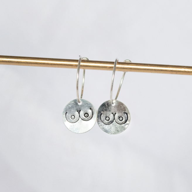 sterling silver wire hoops with boob stamped charms by Lucy Kemp Jewellery