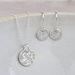 sterling silver small textured circle pendant and mini textured circle earrings by Lucy Kemp Jewellery. 