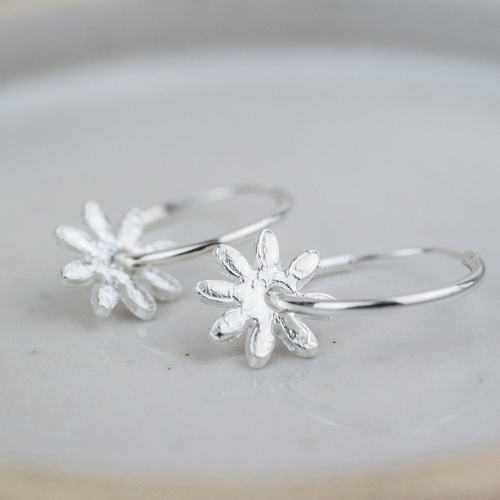 sterling silver daisy charm sleeper hoops