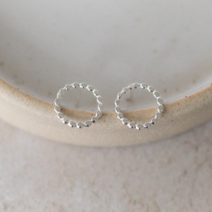 
                  
                    Sterling silver dotty circle studs handmade by Lucy Kemp Jewellery
                  
                