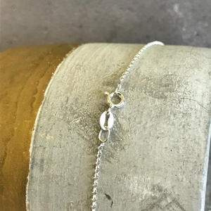 
                  
                    Sterling silver clasp
                  
                
