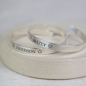 
                  
                    sterling silver engraved christening bangle for children handmade by Lucy Kemp Jewellery - new font
                  
                