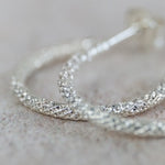 sterling silver frosted everyday hoops made by Lucy Kemp Jewellery