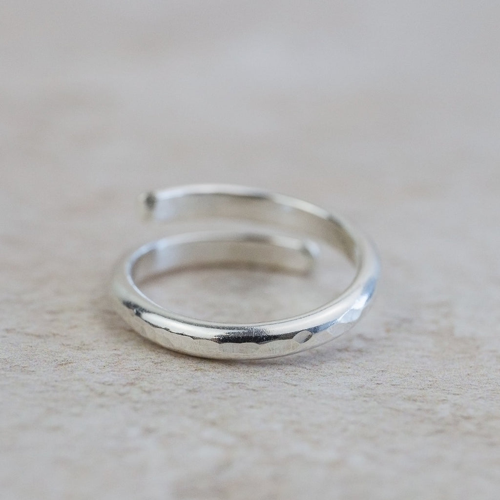 sterling silver hammered texture wrap around adjustable thumb ring by Lucy Kemp Jewellery 