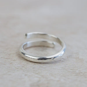 
                  
                    sterling silver hammered texture wrap around adjustable thumb ring by Lucy Kemp Jewellery 
                  
                