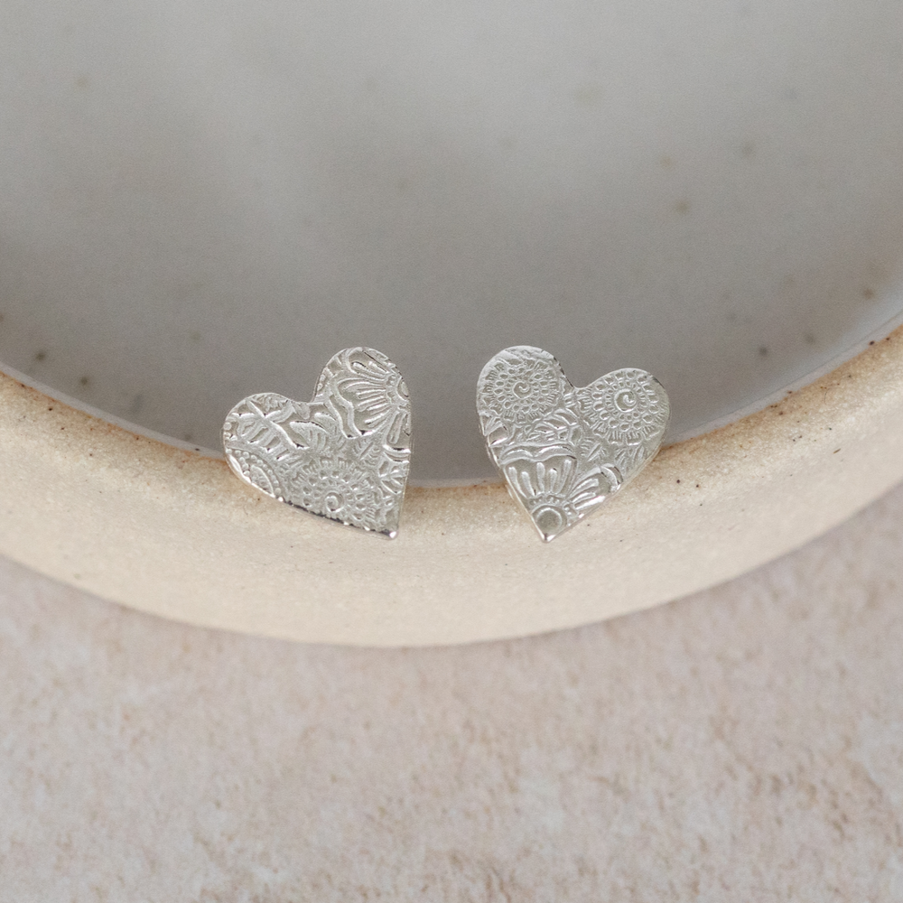 
                  
                    Sterling silver textured heart studs by Lucy Kemp jewellery
                  
                