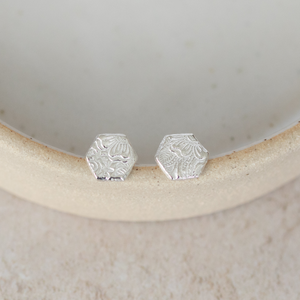 
                  
                    Sterling silver textured hexagon studs by Lucy kemp jewellery
                  
                