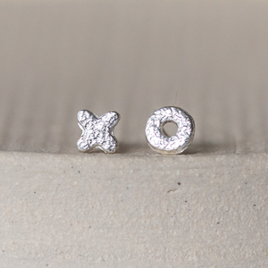 
                  
                    sterling silver textured mini hugs and kisses studs OX
                  
                