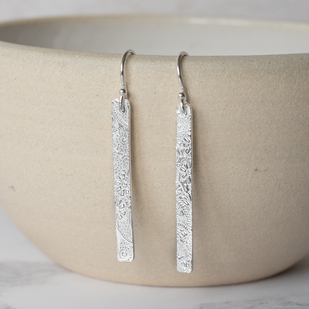 Sterling silver long rectangle textured drop earrings handmade by Lucy Kemp Jewellery