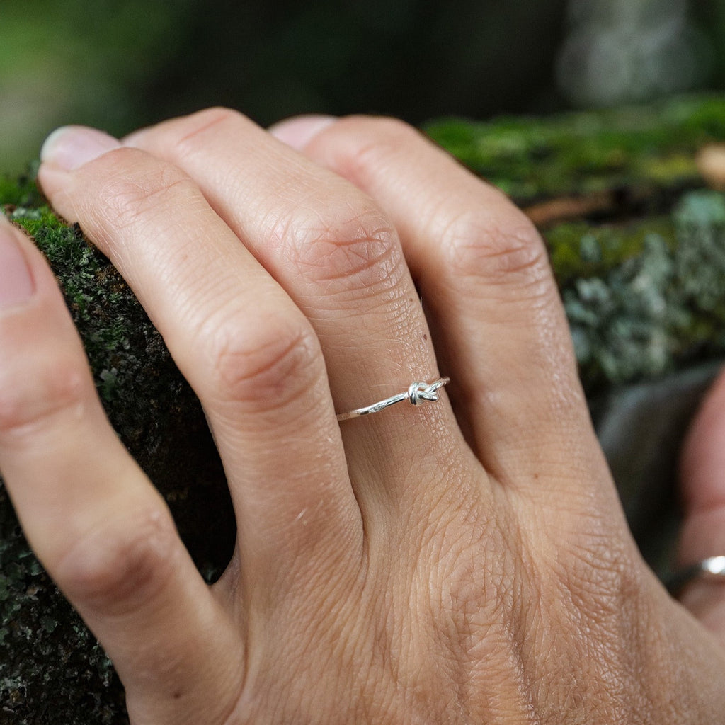 sterling silver love knot ring handmade by Lucy Kemp Jewellery - worn image