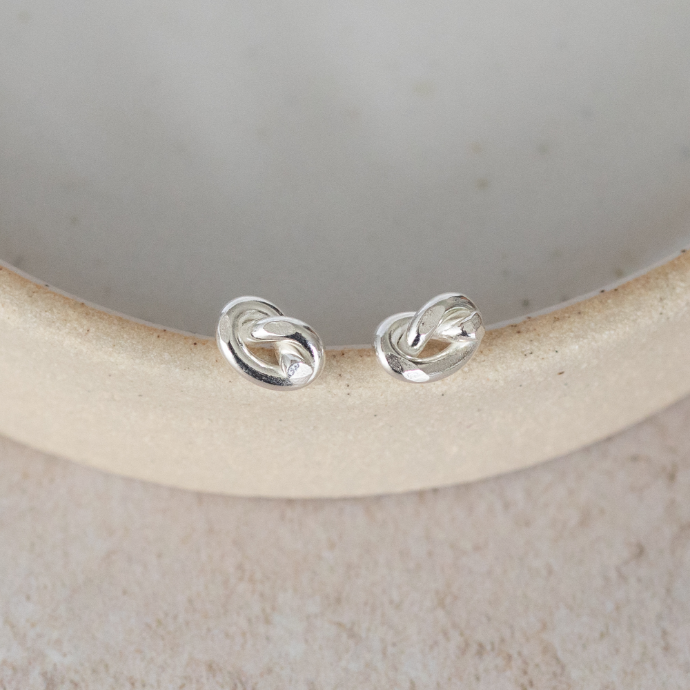 sterling silver love knot studs made with eco wire by Lucy Kemp Jewellery 