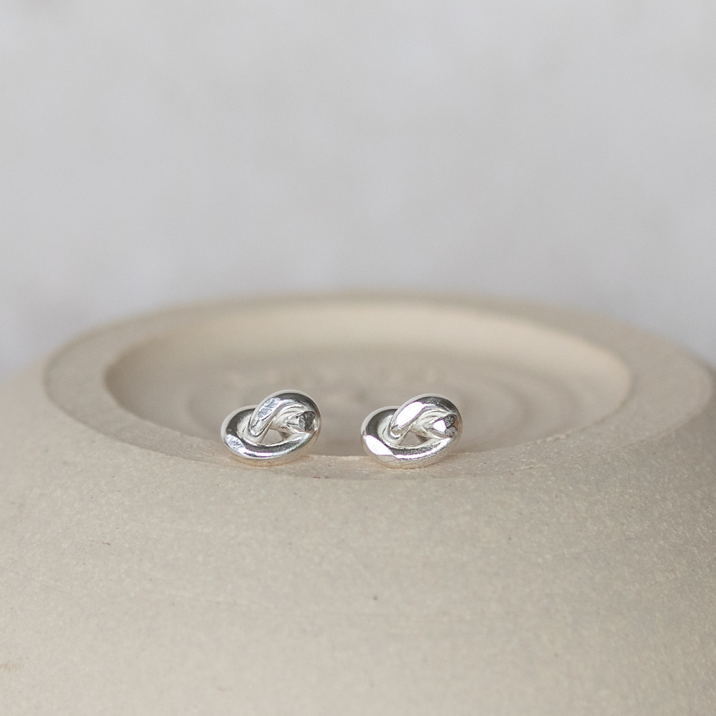 sterling silver love knot studs made with eco wire by Lucy Kemp Jewellery