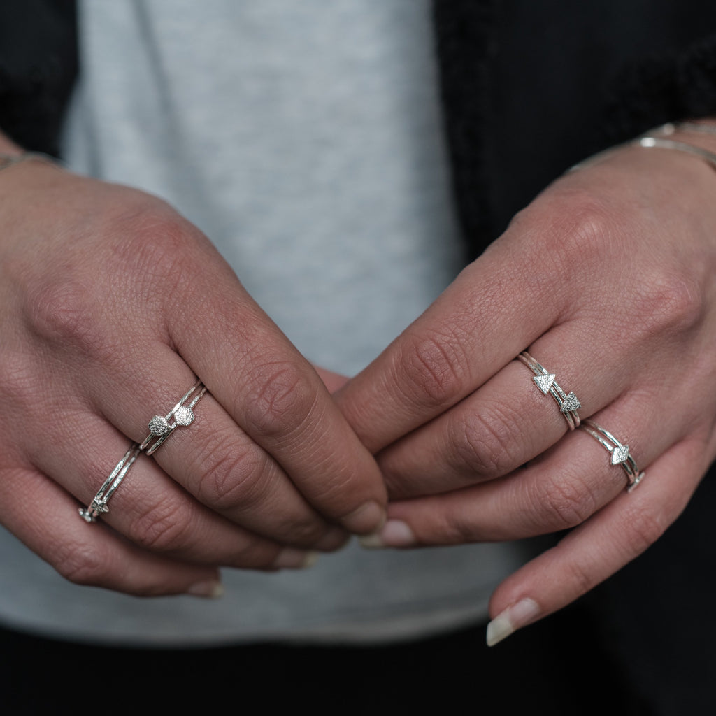 sterling silver mini hexagon charm ring worn, handmade by Lucy Kemp Jewellery 