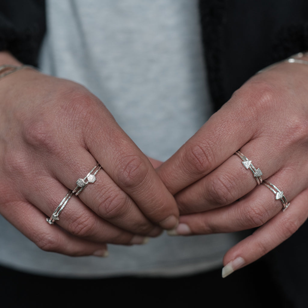 sterling silver mini square charm ring worn, handmade by Lucy Kemp Jewellery 