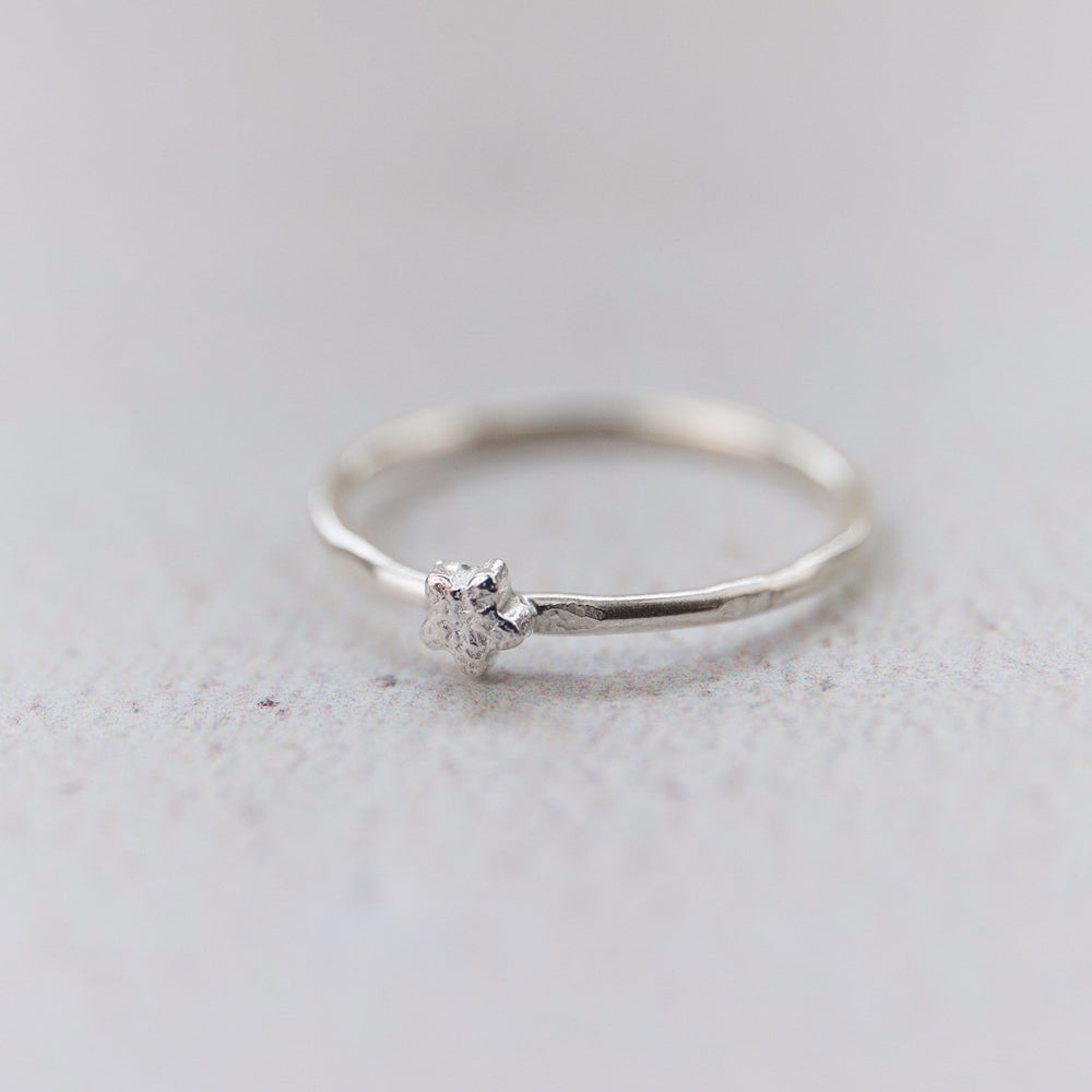
                  
                    sterling silver mini flower charm ring
                  
                