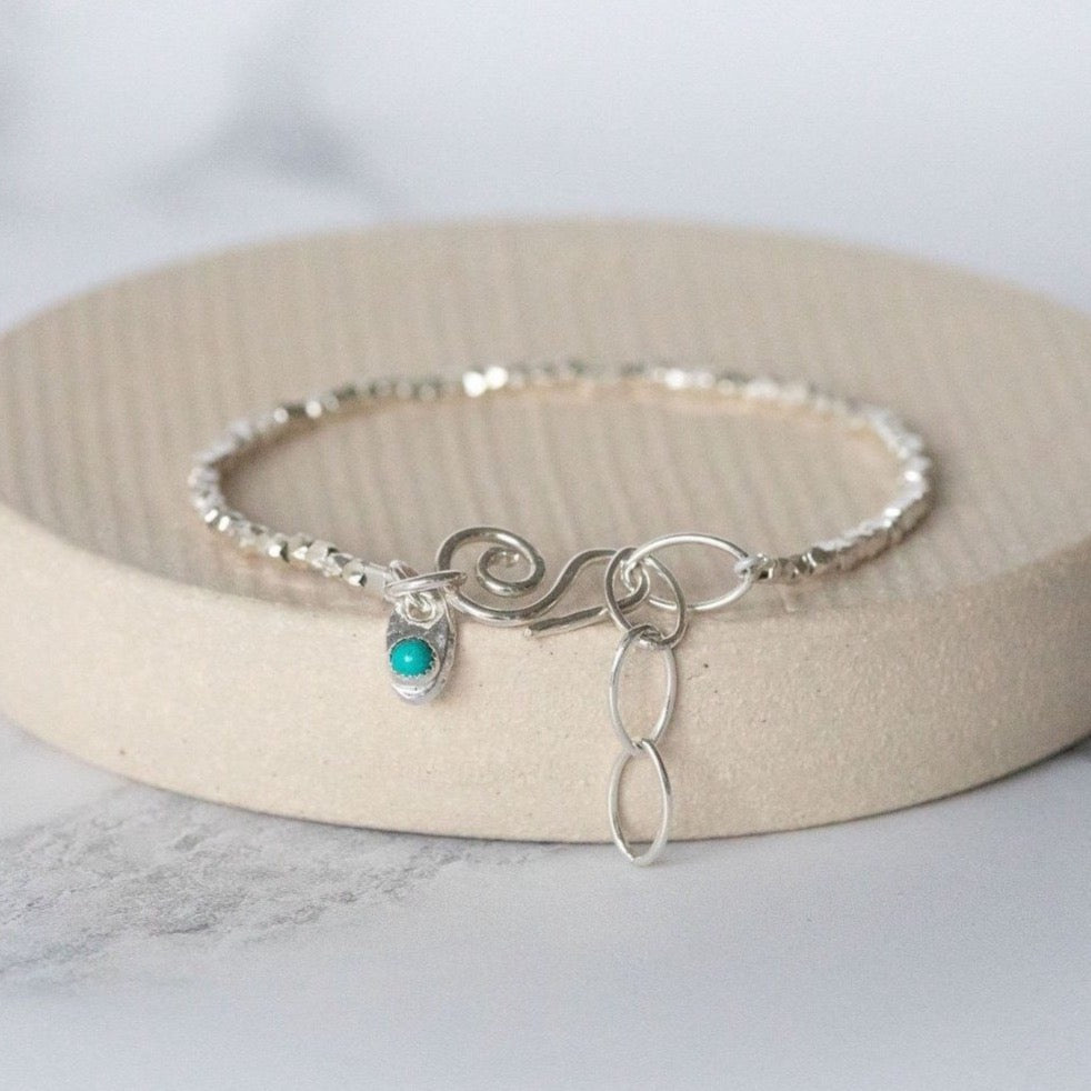sterling silver mini nugget birthstone bracelet handmade by Lucy Kemp Jewellery with turquoise
